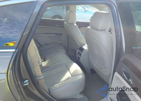 2014 Cadillac Srx Luxury Collection z USA, uszkodzony, nr VIN 3GYFNBE39ES583575